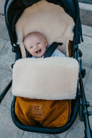 Medical-grade sheepskin stroller liner