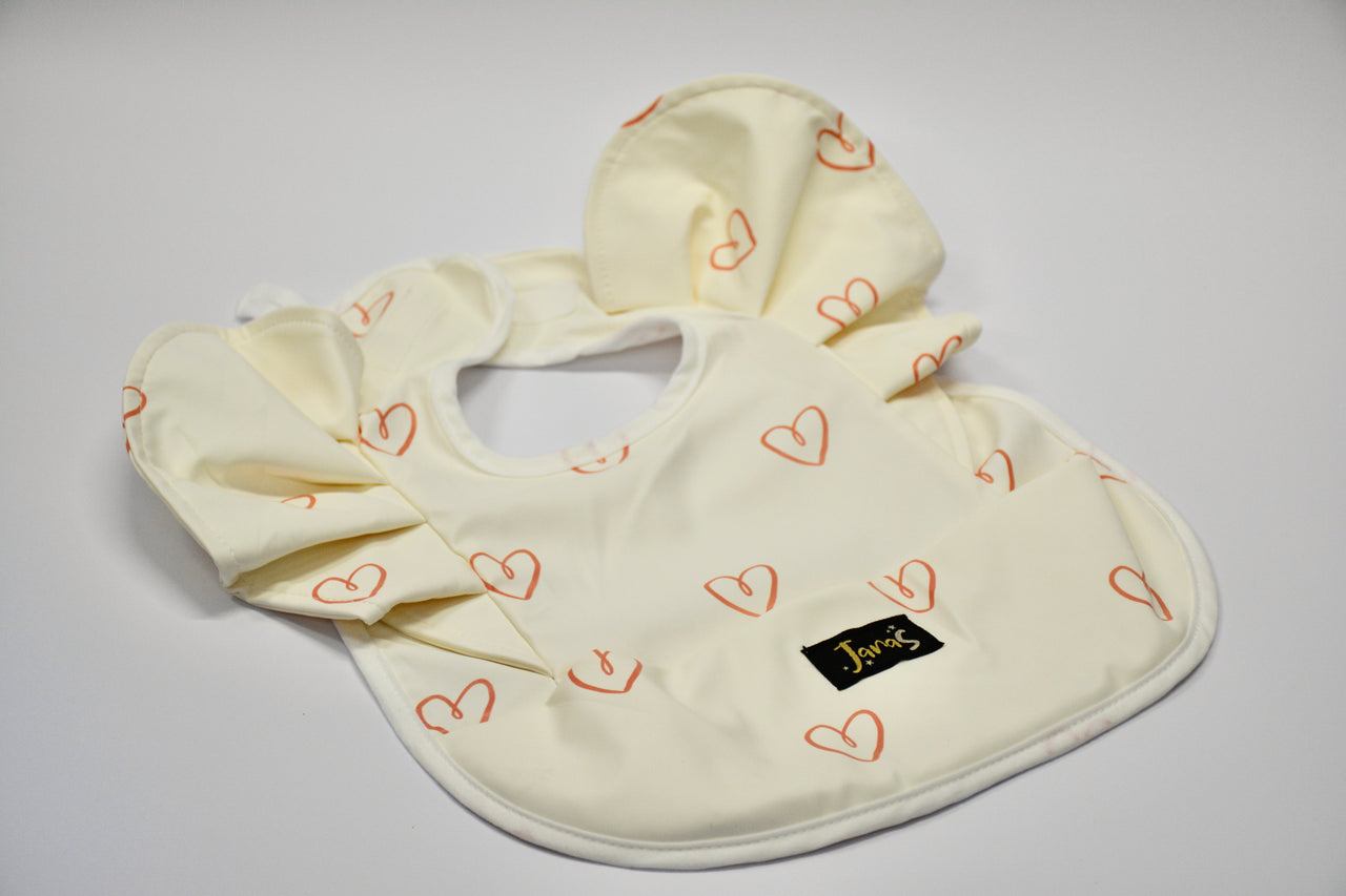 Ruffle bib - Vintage Pink Hearts