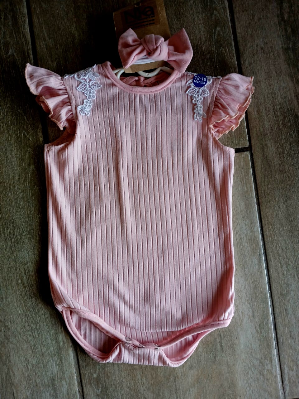 Baby pink stripe vest with lace detail