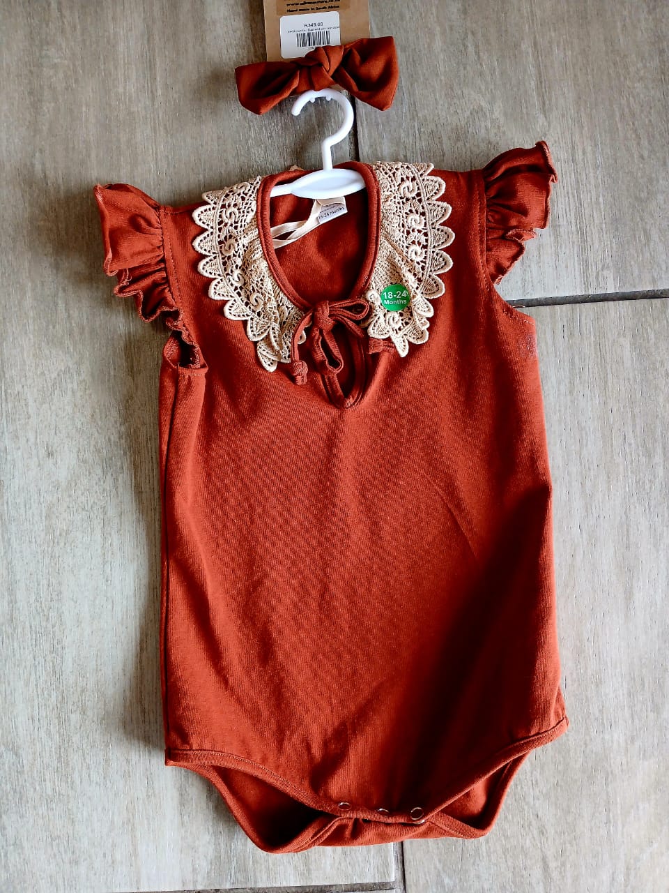 Rust vest with lace detail