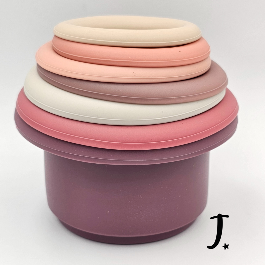 Round stacking cups with shapes