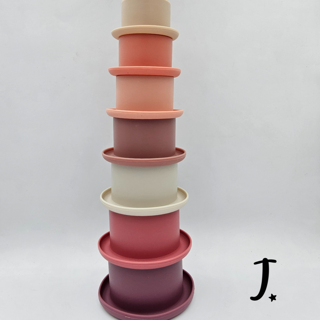 Round stacking cups with shapes
